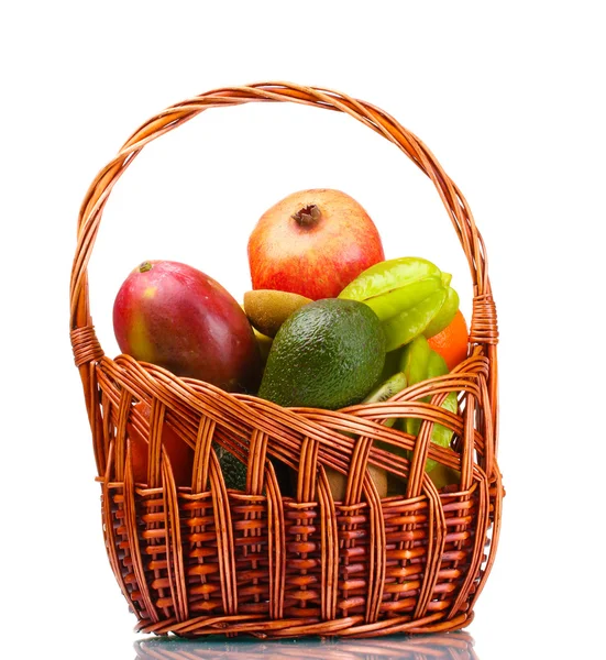 Assortment of exotic fruits in basket isolated on white — Stock Photo, Image