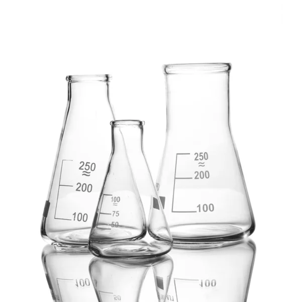 Tres frascos vacíos con reflexión aislada sobre blanco —  Fotos de Stock