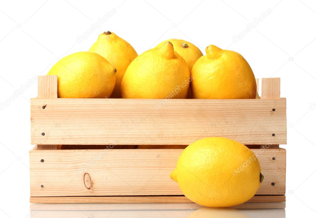 Ripe lemon in wooden box isolated on white