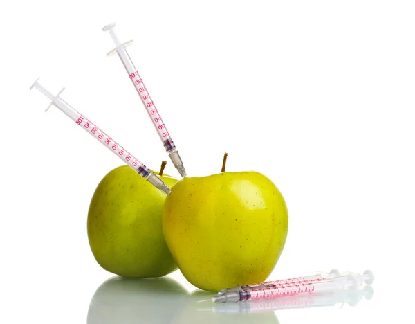 Green apples and syringes isolated on white — Stock Photo, Image
