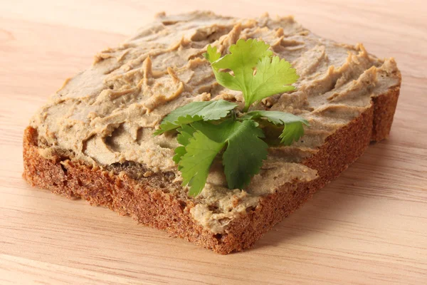 Fresh pate on bread on wooden — Stock Photo, Image