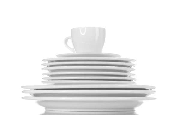 Empty plates and cup isolated on white — Stock Photo, Image