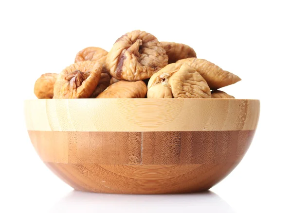 Delicious dried figs in wooden bowl isolated on white — Stock Photo, Image