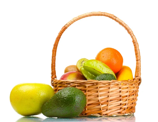 stock image Assortment of exotic fruits in basket isolated on white