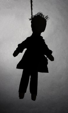 Hanged doll voodoo boy-groom on grey background clipart