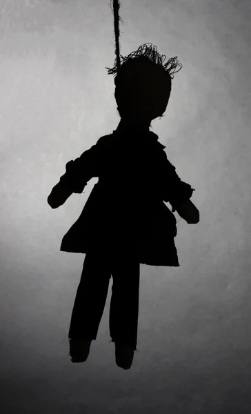 Hanged doll voodoo boy-groom on grey background — Stock Photo, Image