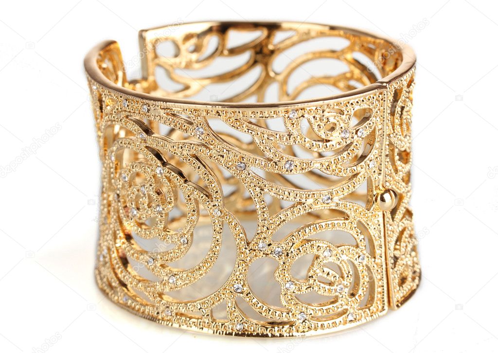 Beautiful gold bracelet isolated on white
