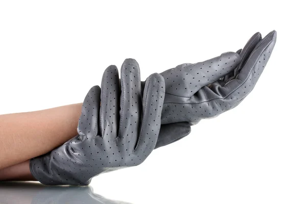 Les mains des femmes en gants en cuir gris isolés sur blanc — Photo