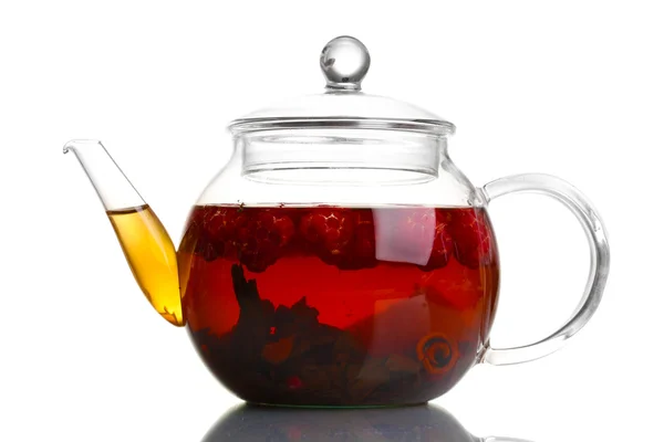 Glass black fruit tea in glass teapot isolated on white — Stock Photo, Image