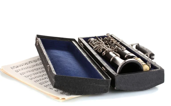 Antique clarinet in case and notebook with notes isolated on white — Stock Photo, Image