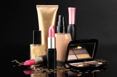 Сosmetics isolated on black clipart