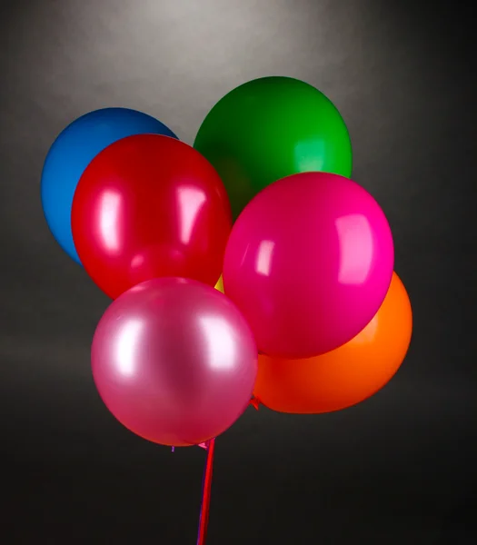 Gri zemin üzerine parlak balonlar — Stok fotoğraf
