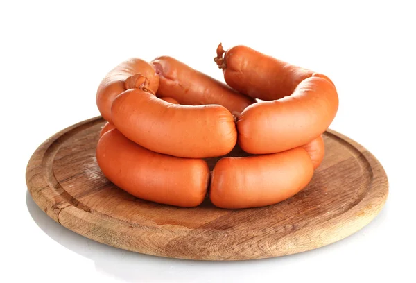 Tasty sausages on wooden board isolation on white — Stock Photo, Image