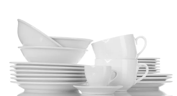 Puste miski, talerze i kubki na białym tle — Zdjęcie stockowe
