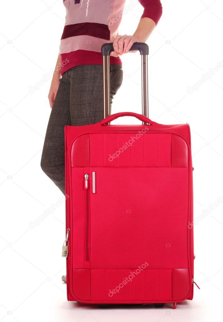 Traveller with a suitcase isolated on white