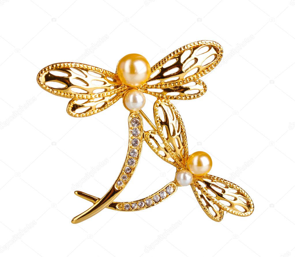Beautiful golden brooch with precious stones isolated on white