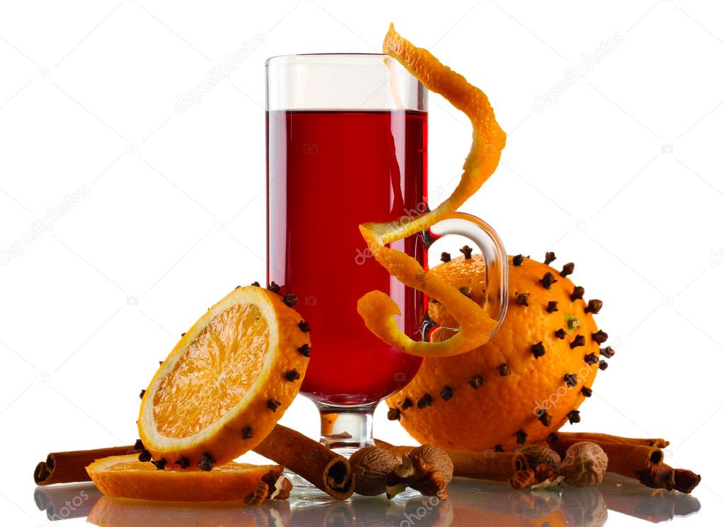 Mulled wine in the glass, spice and orange isolated on white