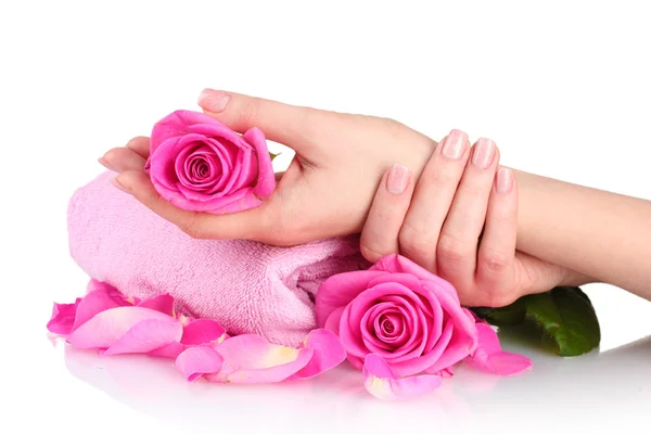 Toalla rosa con rosas y manos sobre fondo blanco —  Fotos de Stock
