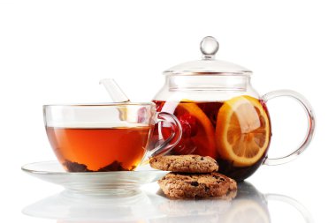 Black fruit tea in glass teaopot and cup isolated on white clipart