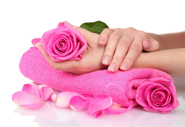 Serviette rose avec roses et mains sur fond blanc — Photo
