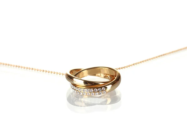 Pingente em forma de anéis com gema isolada em branco — Fotografia de Stock
