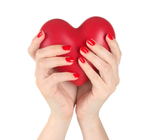 Rød hjerte i kvindens hænder isoleret på hvid - Stock-foto