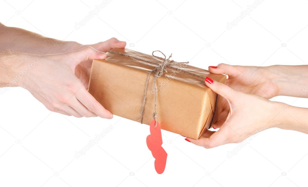 Man's hand giving parcel with blank heart-shaped label to woman isolat