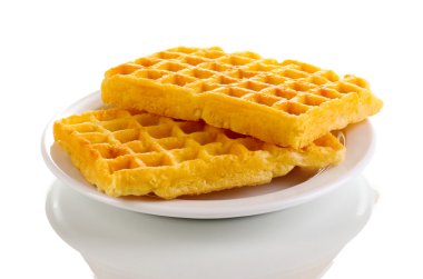 Sweet waffles on plate isolated on white clipart