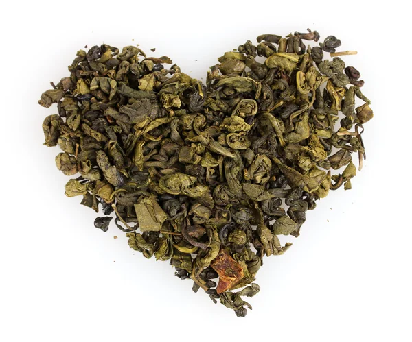 Green dry tea heart shape isolated on white — Stock Photo, Image