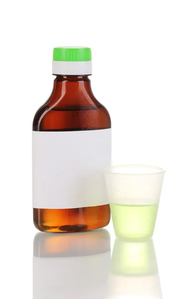Medical bottle and jigger isolated on white — Stock Photo, Image