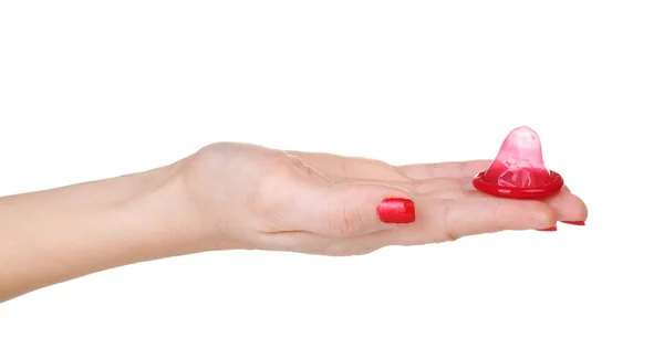 Hand holding a condom isolated on white — Stock Photo, Image