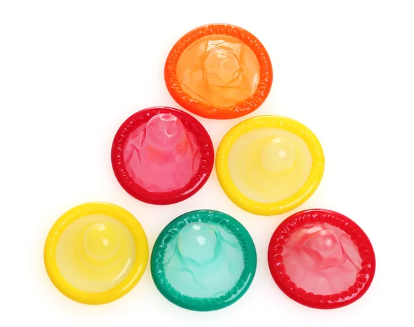 Colorful condoms isolated on white — Stock Photo, Image
