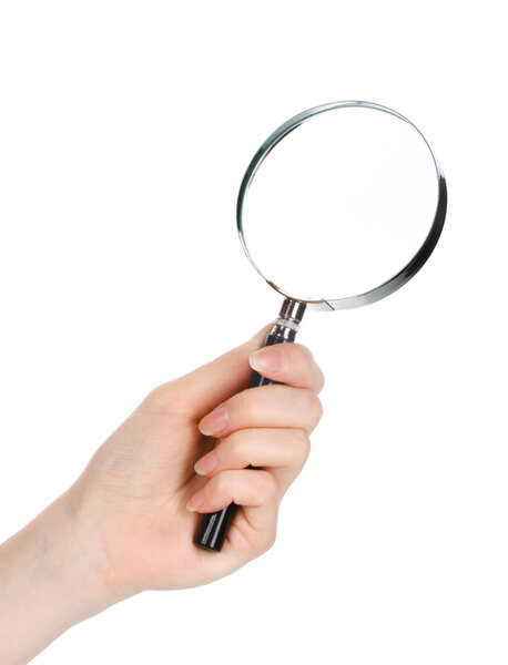 Magnifying glass in hand isolated on white