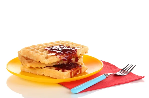 stock image Tasty waffles with jam on plate isolated on white