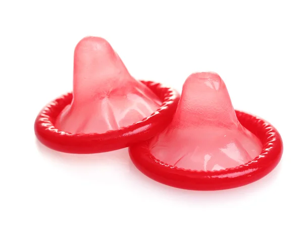 Red condoms isolated on white — Stock Photo, Image