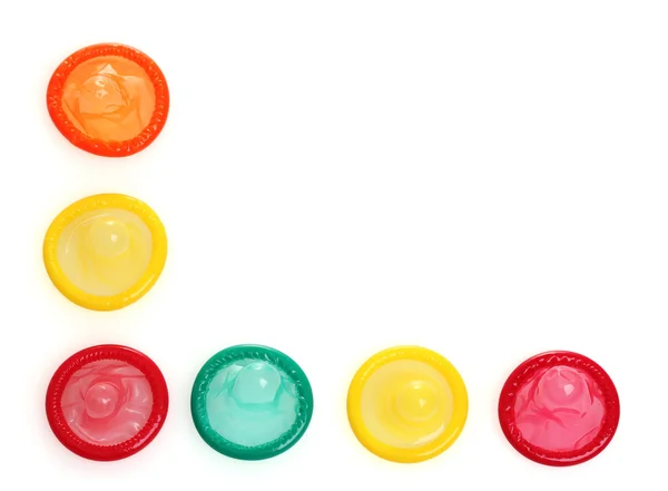 stock image Colorful condoms isolated on white