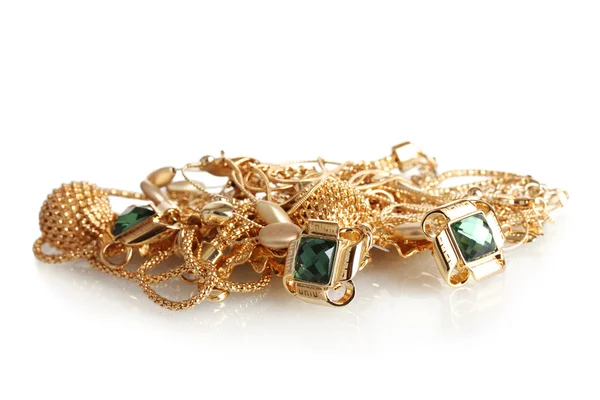 Různé zlaté šperky izolovaných na bílém — Stock fotografie