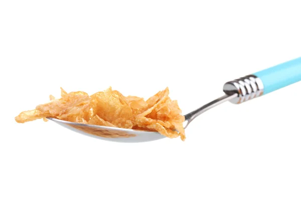 Tasty cornflakes in spoon isolated on white — Stock Photo, Image