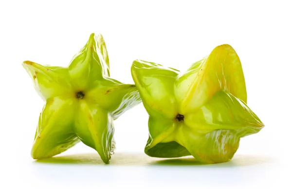 Due frutti freschi di carambola isolati su bianco — Foto Stock