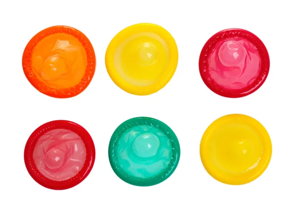 Красочные презервативы, изолированные на белом — стоковое фото