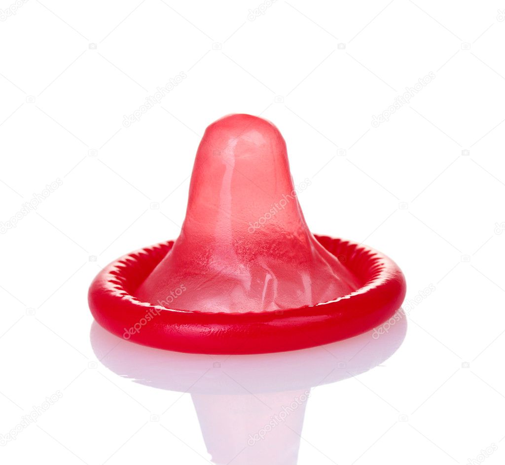 Red condom isolated on white