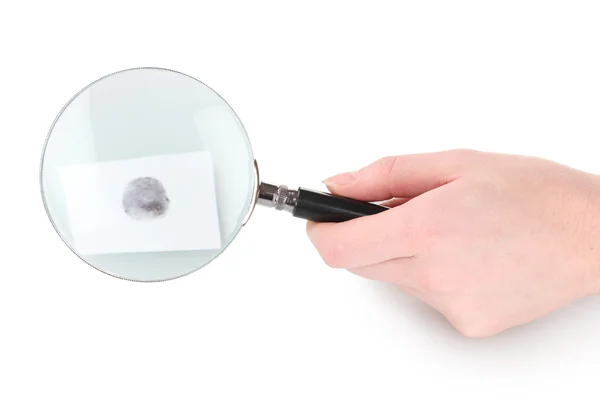 Powiększające szkło w ręku i na białym tle odcisk palca — Zdjęcie stockowe