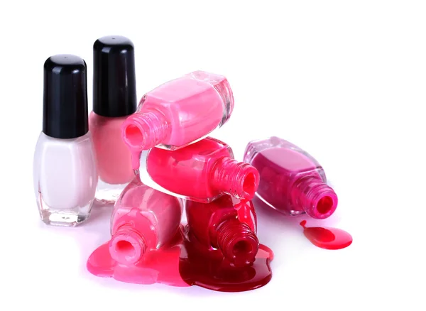 Botellas abiertas con esmalte de uñas brillante aislado en blanco — Foto de Stock