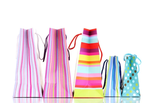 Beyaz izole renkli hediye çantaları — Stok fotoğraf