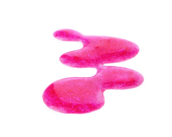Cor-de-rosa gotas de verniz isolado no branco — Fotografia de Stock