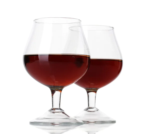 Glasses of brandy isolated on white — Stock Photo, Image