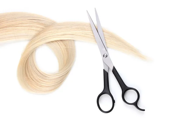 Shiny blond hair and hair cutting shears isolated on white — Stock Photo, Image