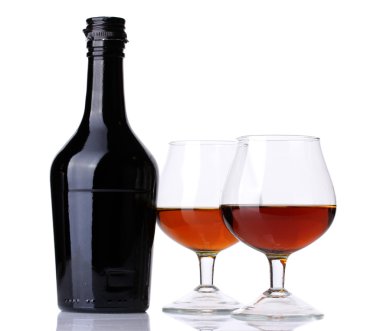 Glasses of brandy and bottle isolated on white clipart