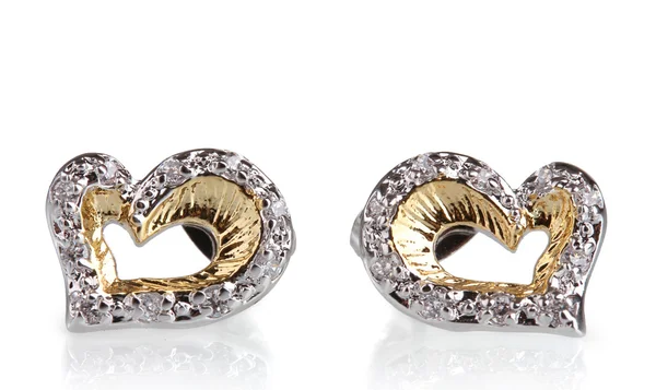 Bellissimi orecchini in oro con pietre preziose isolate su bianco — Foto Stock