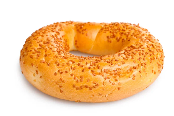 Delicious bagel with sesame seeds isolated on white — Stock Photo, Image